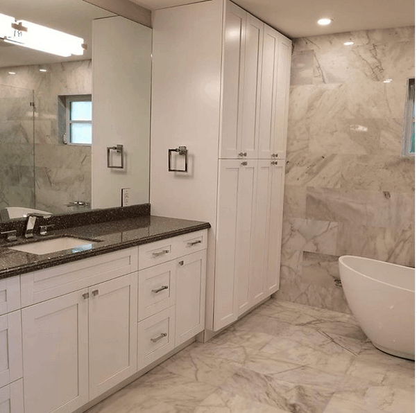 Custom built cabinets and marble install