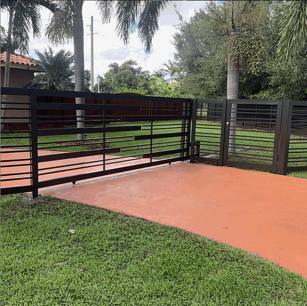 Driveway pressure cleaning and painting and custom built gate