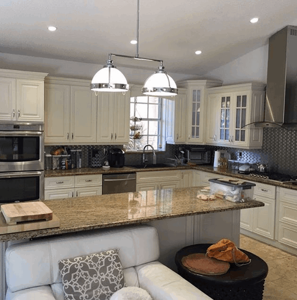 Older kitchen with newly painted cabinets