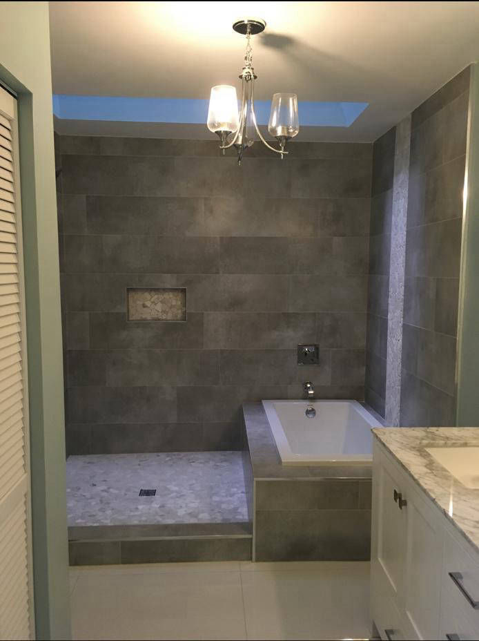 Bathroom remodeling with dark stone