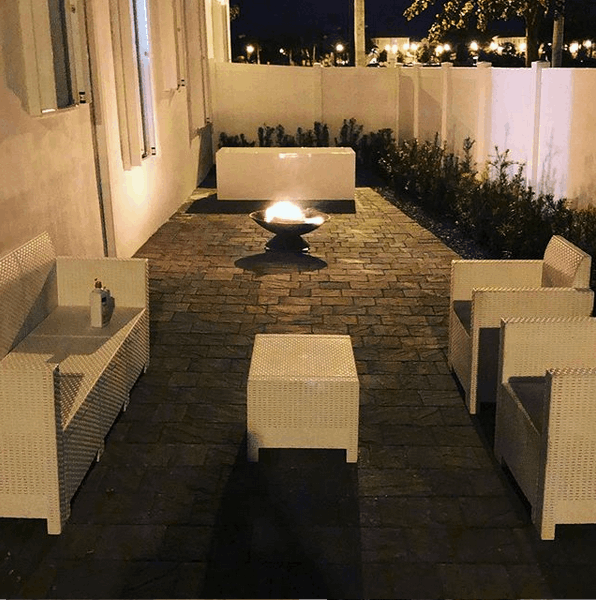 Outdoor pavers, fence and bath