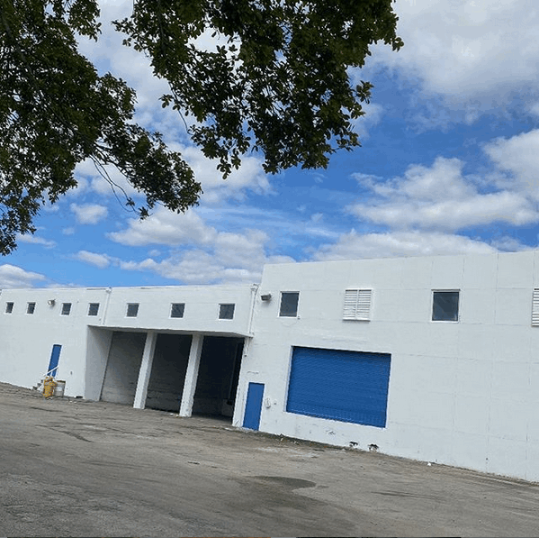 Commercial warehouse, stucco repairs, waterproofing and long last paint coatings